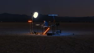 Free Video Stock talented dj playing in a lonely desert Live Wallpaper