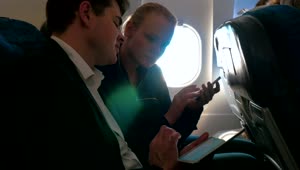 Free Video Stock talking business during a flight Live Wallpaper