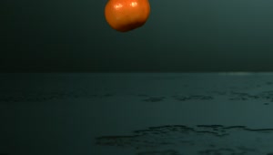 Free Video Stock tangerines bouncing and splashing water Live Wallpaper