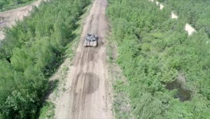 Free Video Stock tank driving over rough terrain Live Wallpaper