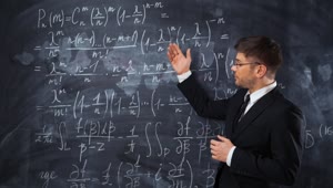 Free Video Stock teacher explaining mathematical formulas Live Wallpaper
