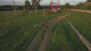 Free Video Stock teen riding a bike in the country Live Wallpaper
