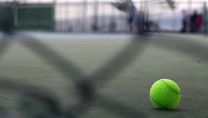 Free Video Stock tennis ball on the ground of a court Live Wallpaper