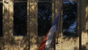 Free Video Stock texas flag waving on a building wall Live Wallpaper