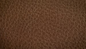 Free Video Stock texture of a brown leather surface close up Live Wallpaper