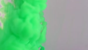 Free Video Stock texture of a cloud of green ink entering water Live Wallpaper