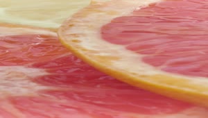 Free Video Stock texture of fresh grapefruit slices Live Wallpaper