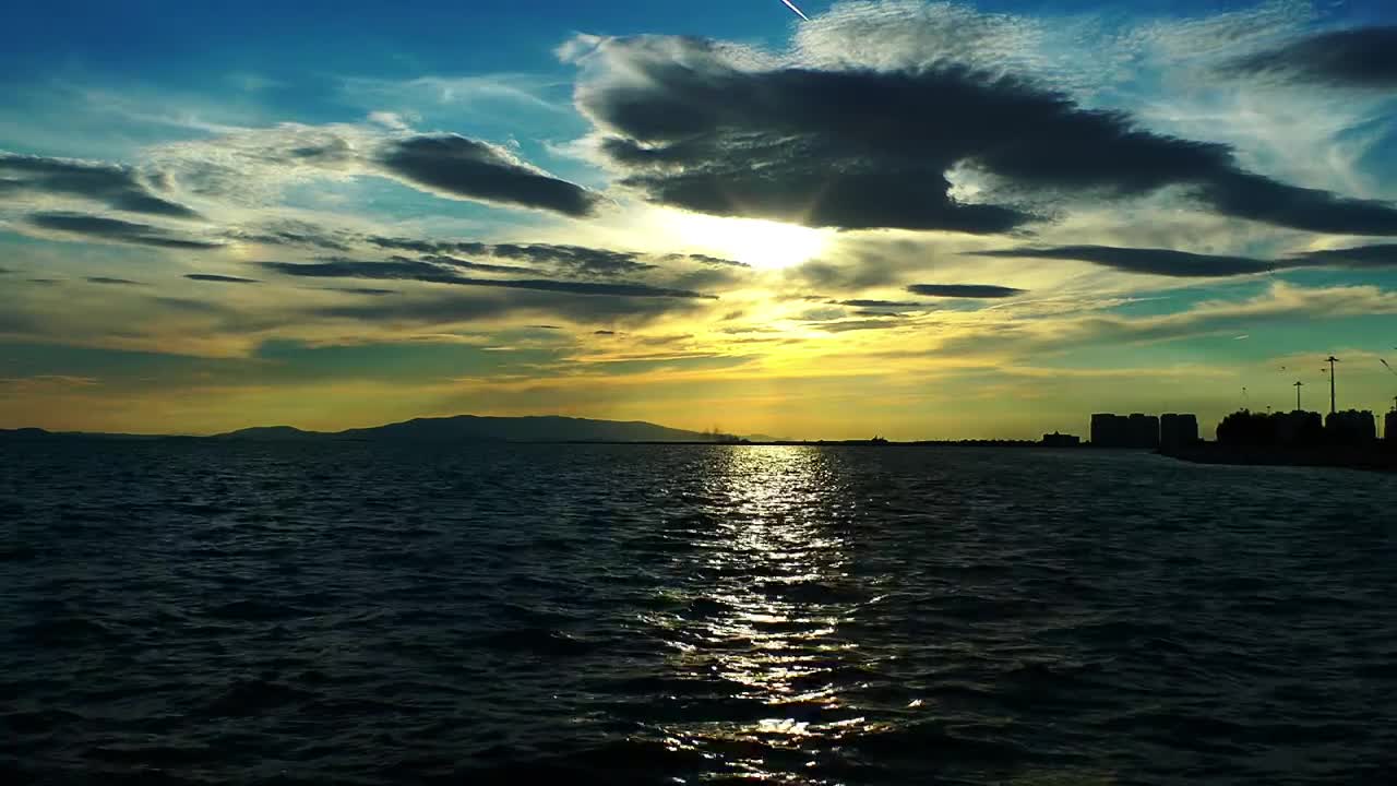 Download Free Video Stock the sea the sky and a city on horizon Live Wallpaper