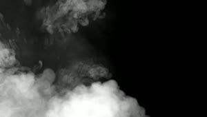 Free Video Stock thick smoke on a black background Live Wallpaper