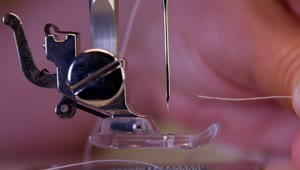 Free Video Stock threading a sewing machine needle Live Wallpaper