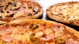 Free Video Stock three different types of pizza Live Wallpaper