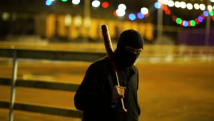 Free Video Stock thug with balaclava walking with a bat Live Wallpaper