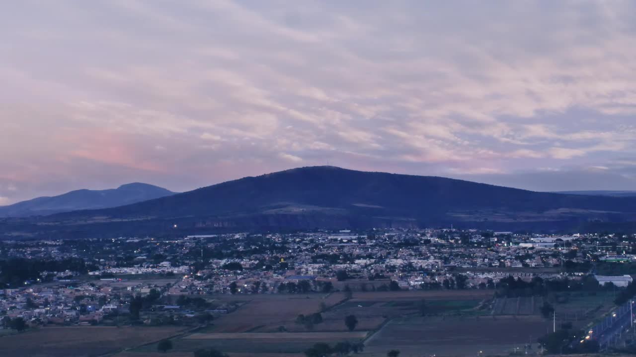 Download Free Video Stock time lapse of a city mountains and traffic Live Wallpaper