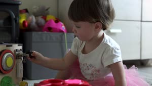 Free Video Stock toddler playing with a homemade toy Live Wallpaper