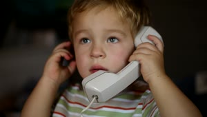 Free Video Stock toddler talking on the phone Live Wallpaper