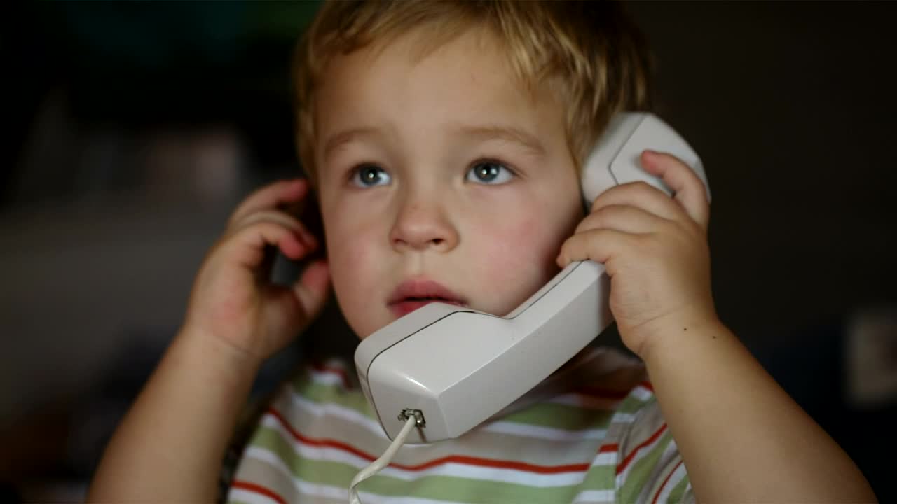 Download Free Video Stock toddler talking on the phone Live Wallpaper