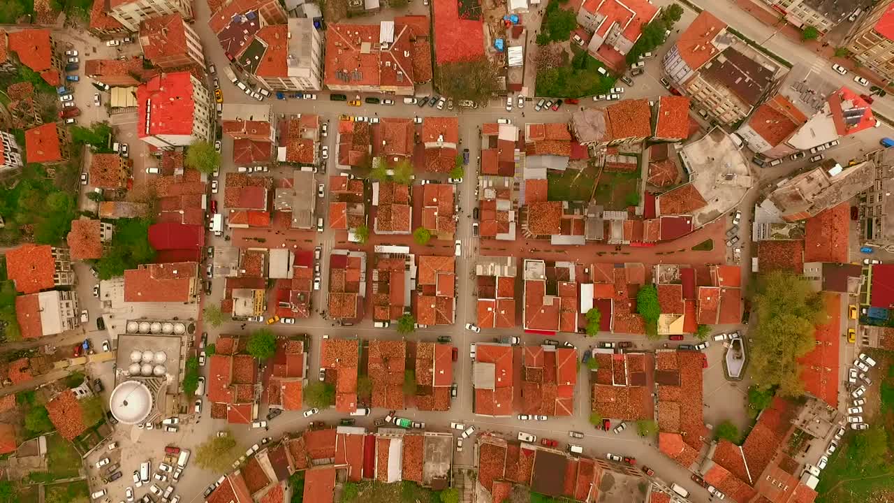 Download Free Video Stock top aerial shot from afar of a little town Live Wallpaper