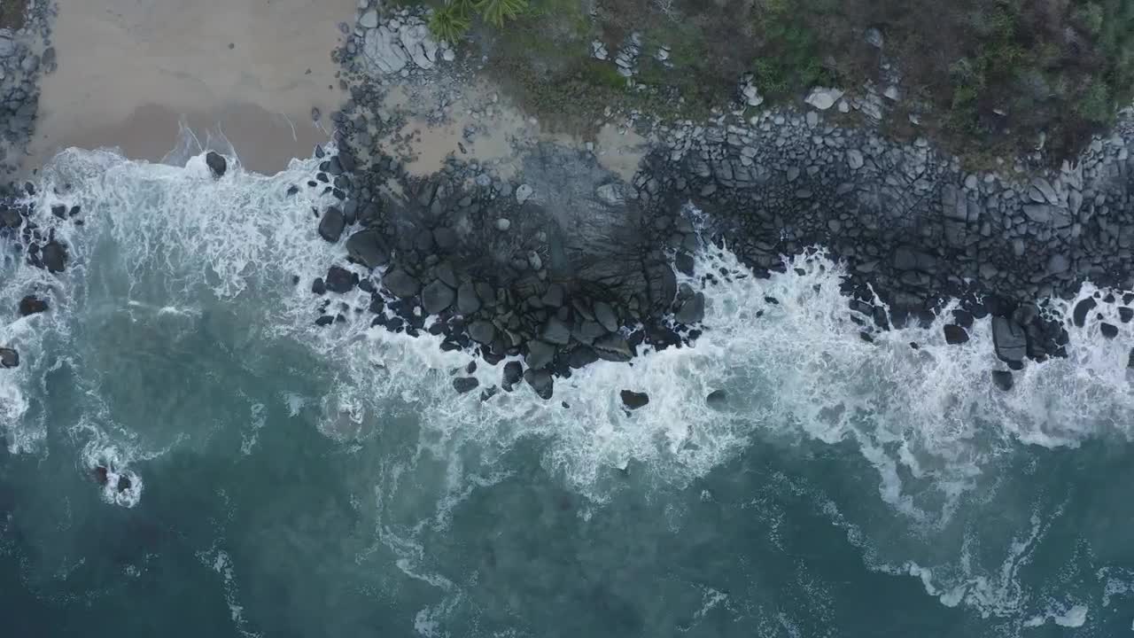 Download Free Video Stock top aerial shot of seashore with rocks Live Wallpaper