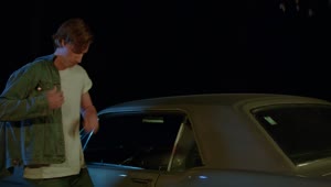 Free Video Stock tough guy with his car outside at night Live Wallpaper