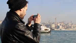 Free Video Stock tourist taking photos to a passenger boat Live Wallpaper