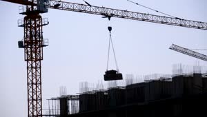 Free Video Stock tower crane silhouette on a construction site Live Wallpaper
