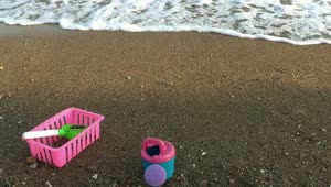 Free Video Stock toys on the sand by the sea Live Wallpaper