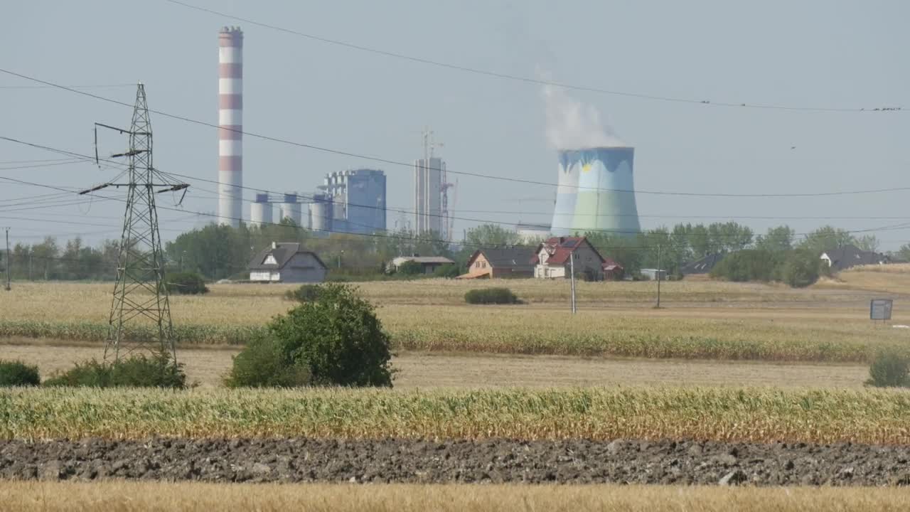 Download Free Video Stock tractor driving through a nuclear field Live Wallpaper