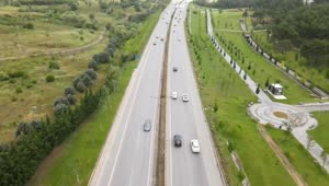 Free Video Stock traffic in a two way highway aerial view Live Wallpaper
