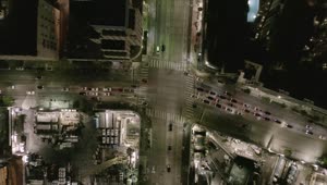 Free Video Stock traffic on an avenue at night aerial top shot Live Wallpaper