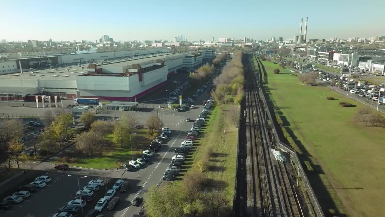 Download Free Video Stock train heading through an industrial city Live Wallpaper