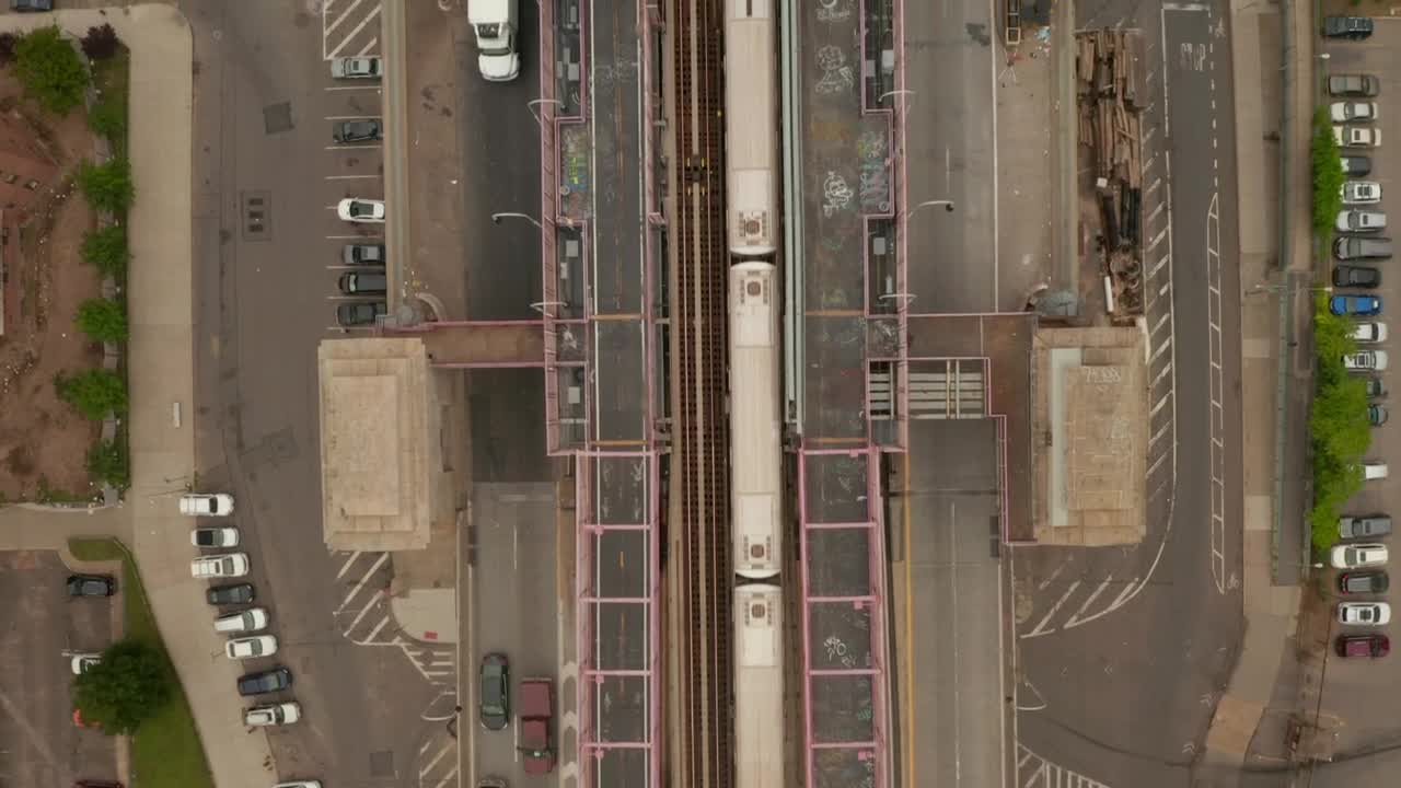 Download Free Video Stock train moving on a bridge across the city Live Wallpaper