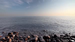 Free Stock Video Waves Reaching The Rocky Seashore At Sunset Live Wallpaper