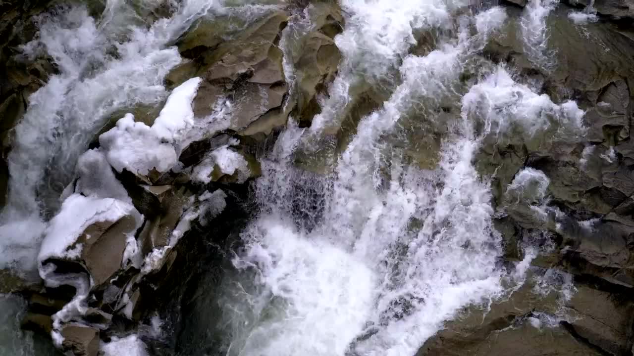 Download Free Stock Video Water Flowing Through The Rocks In The Mountain Live Wallpaper