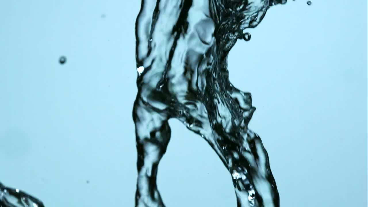 Download Free Stock Video Water Falling In Slow Motion On A Blue Background Live Wallpaper