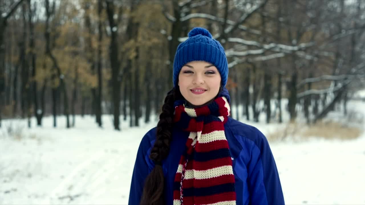 Download Free Stock Video Warm Woman During Winter Walking Head On In A Forest Live Wallpaper