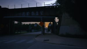 Free Stock Video Walking Through The City Under A Bridge At Sunset Live Wallpaper
