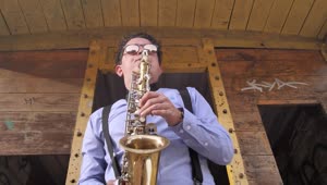 Free Stock Video Urban Saxophonist Playing On The Street Low View Live Wallpaper