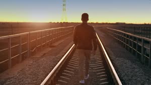 Free Stock Video Urban Man Walking On The Train Tracks Live Wallpaper