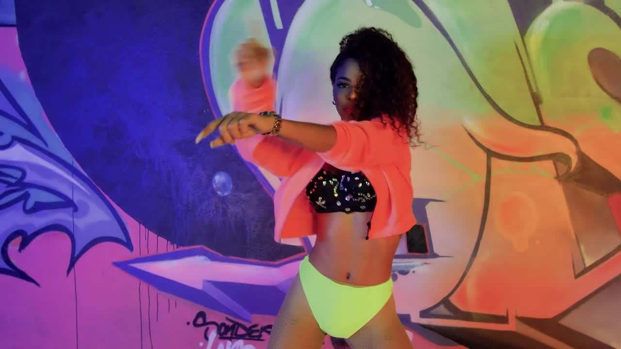 Download Free Stock Video Urban Girl Dancing In Front Of A Wall With Graffiti Live Wallpaper
