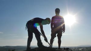 Free Stock Video Two Mountaineers On A Peak Under The Blazing Sun Live Wallpaper