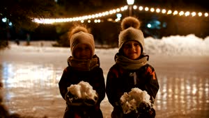 Free Stock Video Two Little Kids Happily Throwing Snow Into The Air Live Wallpaper