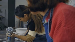 Free Stock Video Two Girls Working With Clay In A Pottery Workshop Live Wallpaper