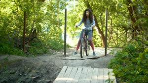 Free Stock Video Two Girls Riding Bikes In An Adventure Park Live Wallpaper