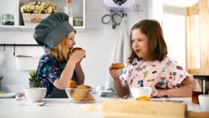 Free Stock Video Two Girls In A Kitchen Eating Fresh Cookies Live Wallpaper