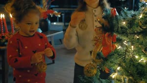 Free Stock Video Two Girls Decorating A Christmas Tree Live Wallpaper