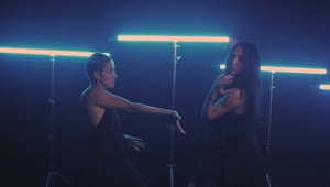 Free Stock Video Two Girls Dancing With Blue Neon Lights In The Background Live Wallpaper