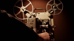 Free Stock Video Turning On A Vintage Film Projector Live Wallpaper