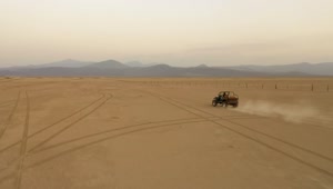 Free Stock Video Traveling Arid Desert Aboard A Jeep Aerial Shot Live Wallpaper