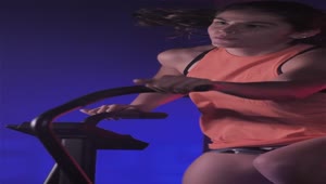 Free Stock Video Young Woman Using An Air Bike In Her Workout Live Wallpaper