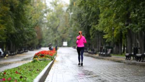 Free Stock Video Young Woman Running Through An Empty Park Live Wallpaper